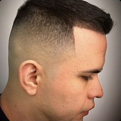 Skin fade with a razor line-up, side profile